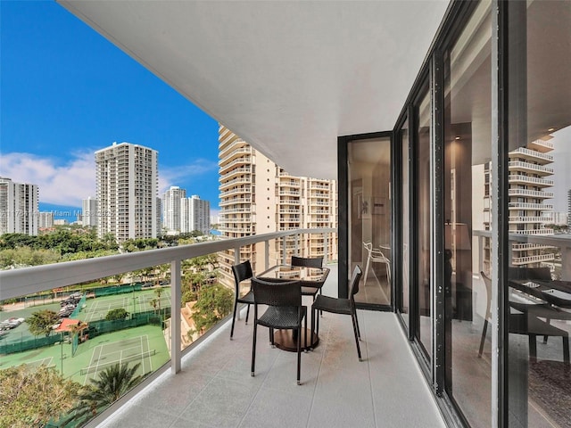 balcony featuring a view of city