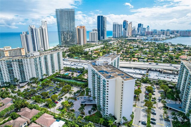 19380 Collins Ave Unit 307, Sunny Isles Beach, FL 33160 - exercise room with a high ceiling, wood finished floors, and a paneled ceiling