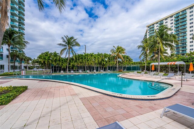 19380 Collins Ave Unit 307, Sunny Isles Beach, FL 33160 - pool featuring a patio area and fence