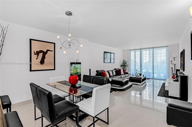 19380 Collins Ave Unit 307, Sunny Isles Beach, FL 33160 - dining space featuring a wall of windows, a chandelier, and light tile patterned floors