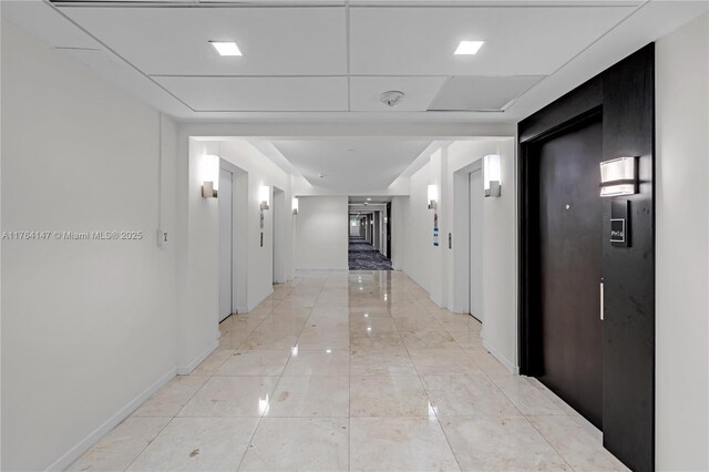 19380 Collins Ave Unit 307, Sunny Isles Beach, FL 33160 - hallway with elevator and baseboards