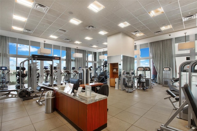 gym with a wealth of natural light and visible vents