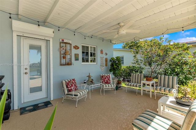 view of patio featuring ceiling fan