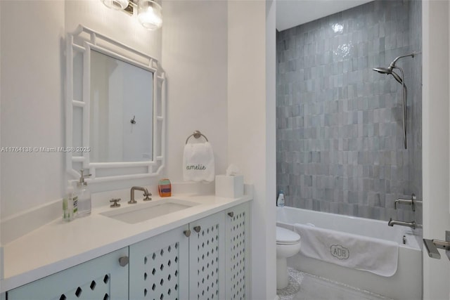 bathroom featuring tub / shower combination, toilet, and vanity