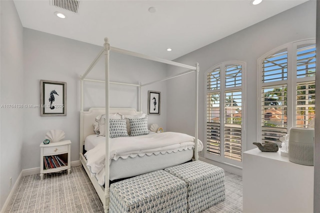 bedroom with recessed lighting, visible vents, and baseboards