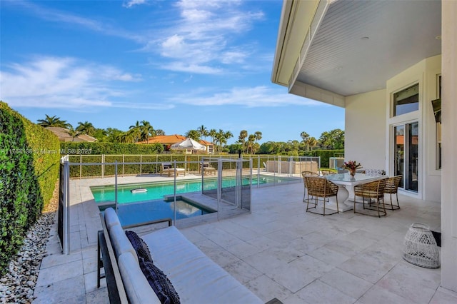 view of swimming pool featuring a fenced in pool, a patio area, and fence