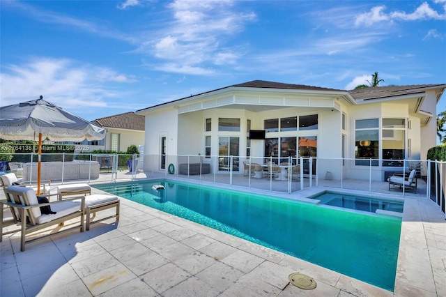 view of swimming pool featuring a fenced in pool, a patio, and fence