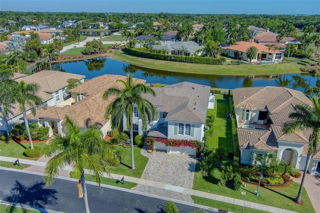 bird's eye view with a residential view and a water view