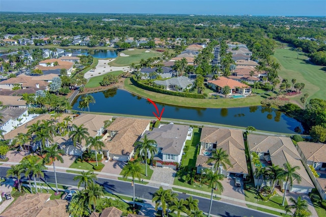 birds eye view of property featuring a residential view, golf course view, and a water view