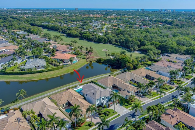 aerial view featuring a residential view and a water view