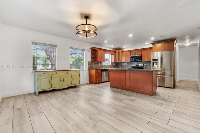 kitchen with baseboards, open shelves, stainless steel appliances, a notable chandelier, and backsplash