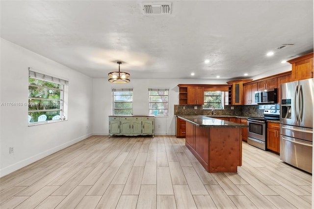 kitchen with open shelves, stainless steel appliances, visible vents, and decorative backsplash