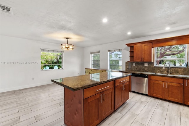 kitchen with visible vents, a sink, open shelves, stainless steel dishwasher, and decorative backsplash