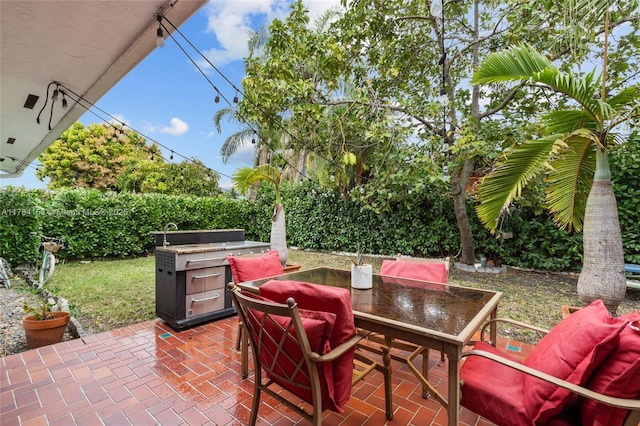 view of patio featuring outdoor dining space