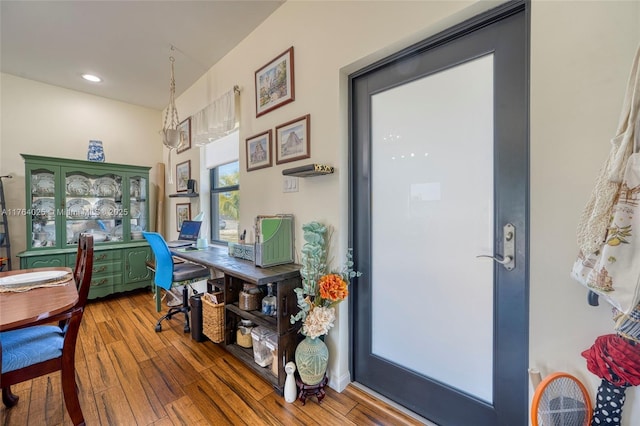 office with recessed lighting and hardwood / wood-style floors