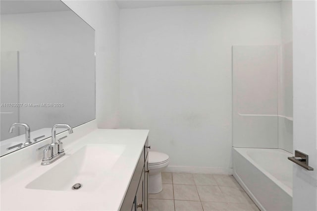 full bathroom featuring tile patterned floors, toilet, vanity, and baseboards