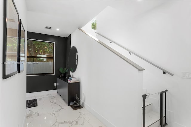 hall featuring recessed lighting, baseboards, visible vents, and marble finish floor