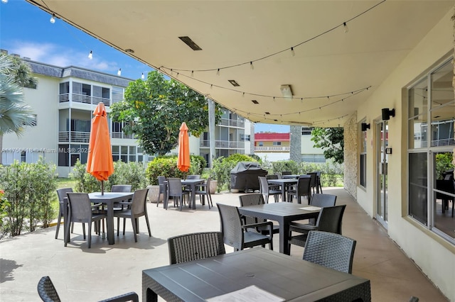 view of patio with outdoor dining area