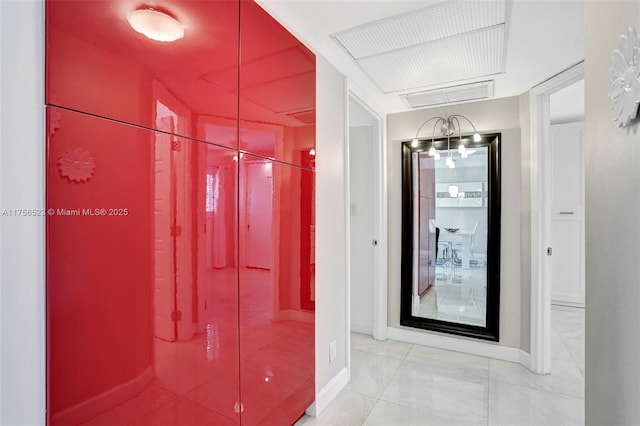 bathroom featuring visible vents and tile patterned flooring