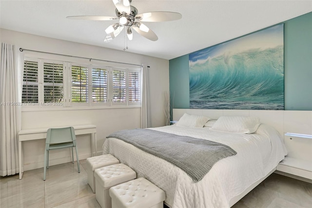 bedroom with tile patterned flooring and a ceiling fan