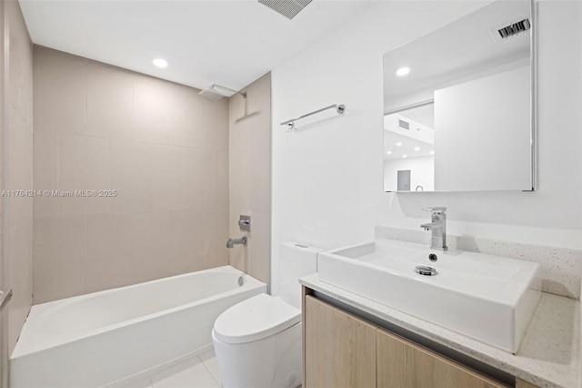 full bathroom featuring visible vents, vanity, toilet, and shower / bathing tub combination