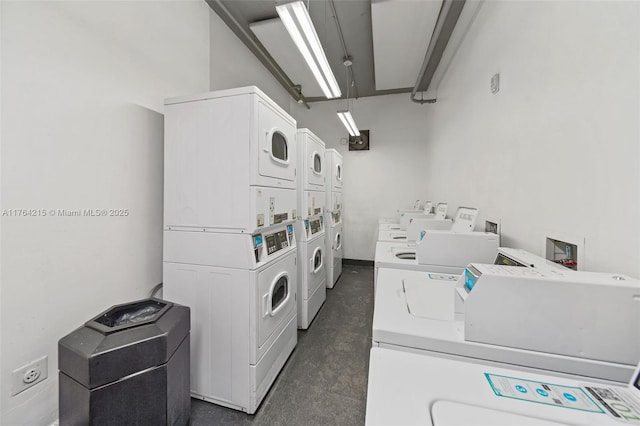 shared laundry area with washer and dryer and stacked washing maching and dryer