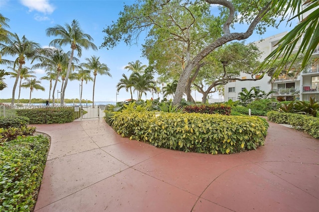 surrounding community featuring a gate and fence