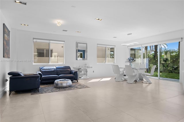 interior space with visible vents and tile patterned flooring