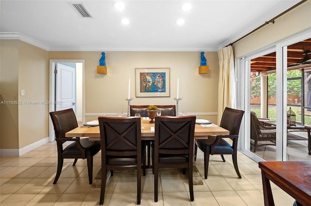 dining room with visible vents, crown molding, baseboards, light tile patterned floors, and recessed lighting