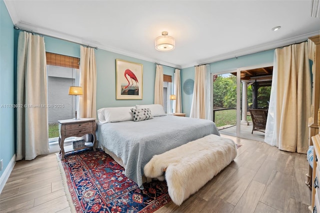 bedroom with access to exterior, crown molding, and wood finished floors