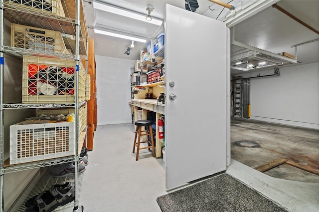 basement with a workshop area