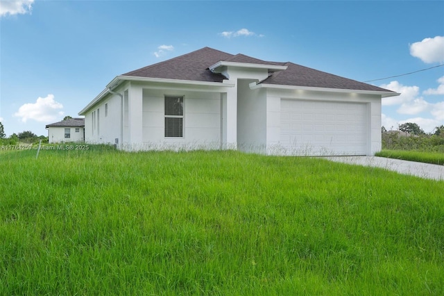 exterior space with stucco siding, a garage, driveway, and a shingled roof