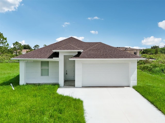 ranch-style house with a front yard, concrete driveway, roof with shingles, and an attached garage