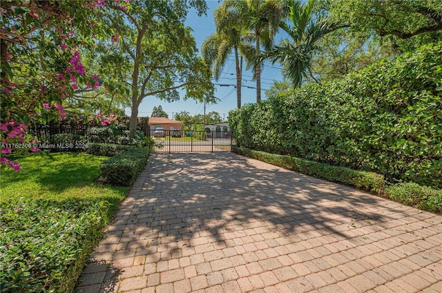 view of gate with fence