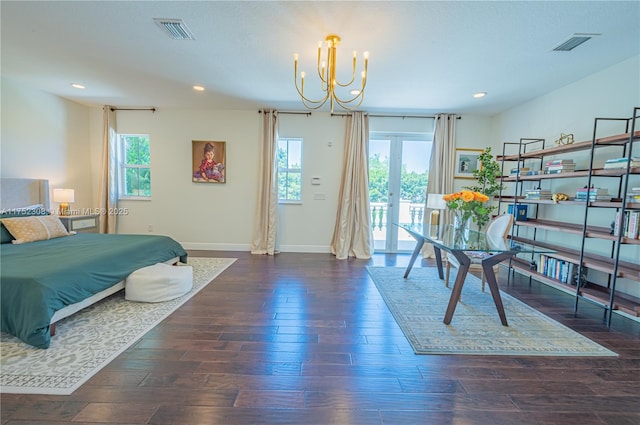 interior space featuring visible vents, an inviting chandelier, access to exterior, and dark wood-style floors