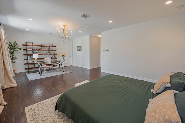 bedroom with visible vents, baseboards, recessed lighting, an inviting chandelier, and hardwood / wood-style flooring