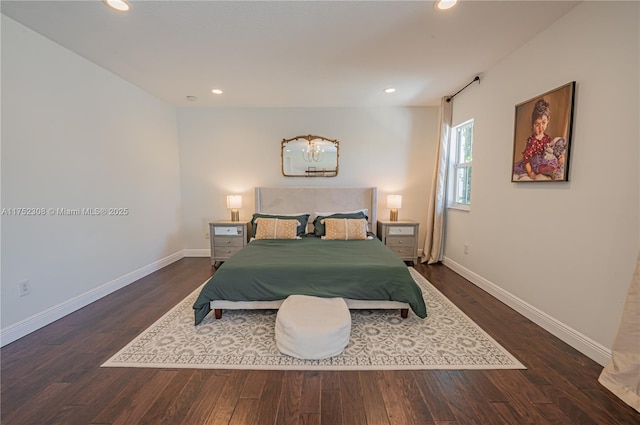 bedroom with recessed lighting, wood finished floors, and baseboards