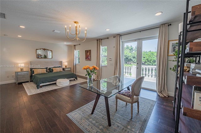 bedroom featuring baseboards, a chandelier, dark wood finished floors, recessed lighting, and access to outside