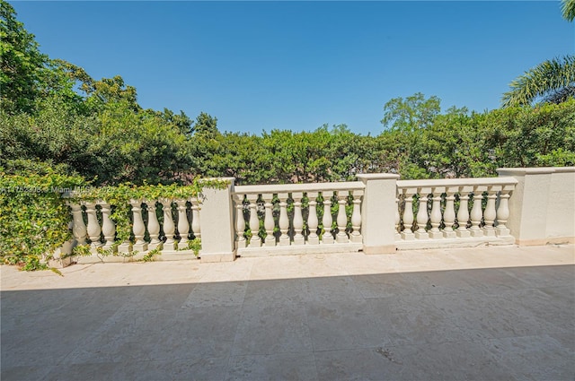 view of gate featuring fence