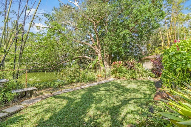 view of yard with fence