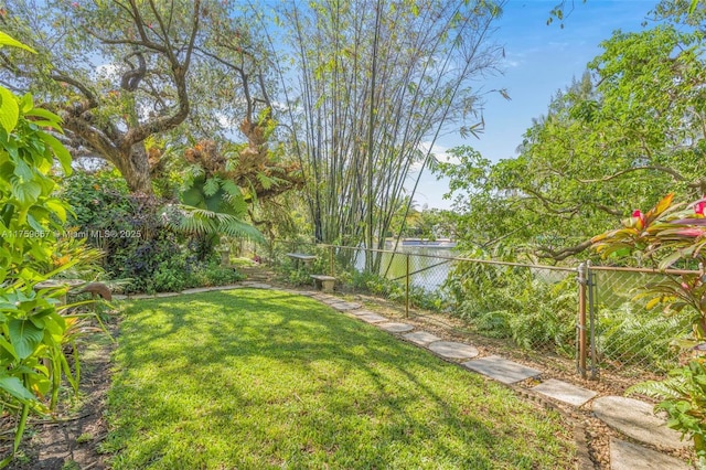 view of yard with a fenced backyard