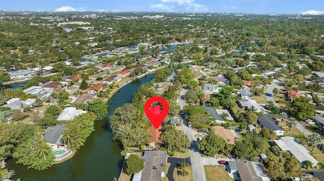 aerial view with a residential view and a water view