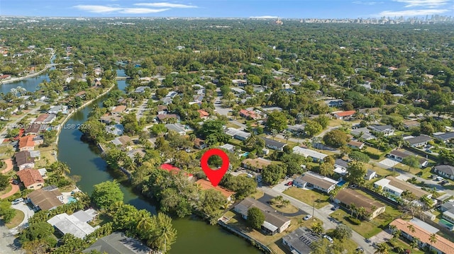 birds eye view of property featuring a residential view and a water view