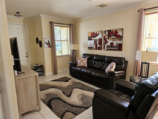 living area featuring light tile patterned floors, visible vents, baseboards, and ornamental molding