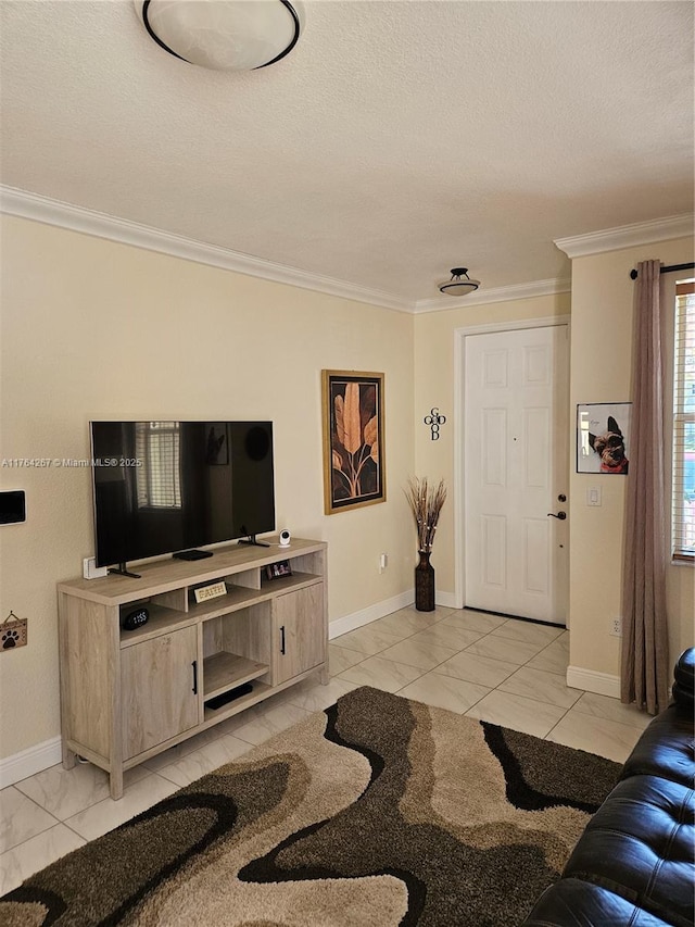 living area featuring baseboards, a textured ceiling, marble finish floor, and crown molding