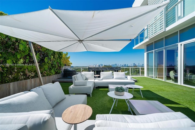 4701 N Meridian Ave Unit 603, Miami Beach, FL 33140 - view of patio / terrace with a view of city and outdoor lounge area