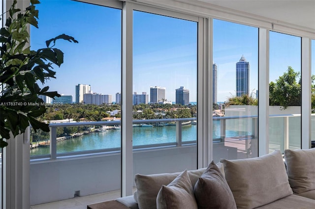 4701 N Meridian Ave Unit 603, Miami Beach, FL 33140 - sunroom / solarium featuring a city view and a water view