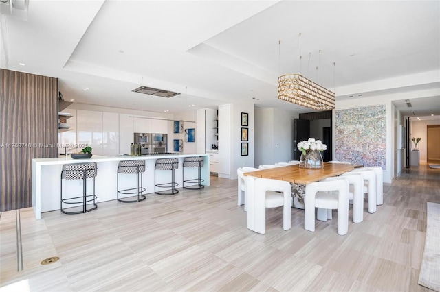 4701 N Meridian Ave Unit 603, Miami Beach, FL 33140 - dining area with visible vents and a raised ceiling