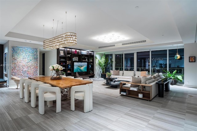 4701 N Meridian Ave Unit 603, Miami Beach, FL 33140 - dining area with a tray ceiling