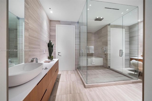 4701 N Meridian Ave Unit 603, Miami Beach, FL 33140 - bathroom with vanity, tile walls, and a shower stall